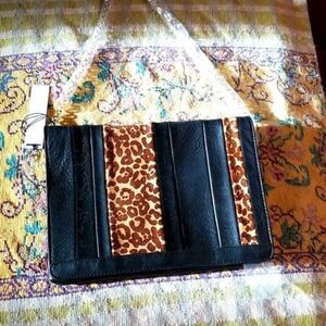 GORGEOUS BLACK AND BROWN  LEOPARD LEATHER BAG!!! NWT!!! NEVER WORN OR CARRIED!!!